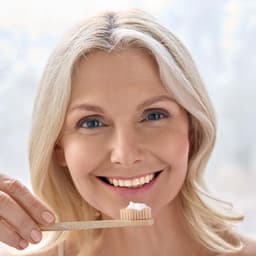 Woman with Toothbrush